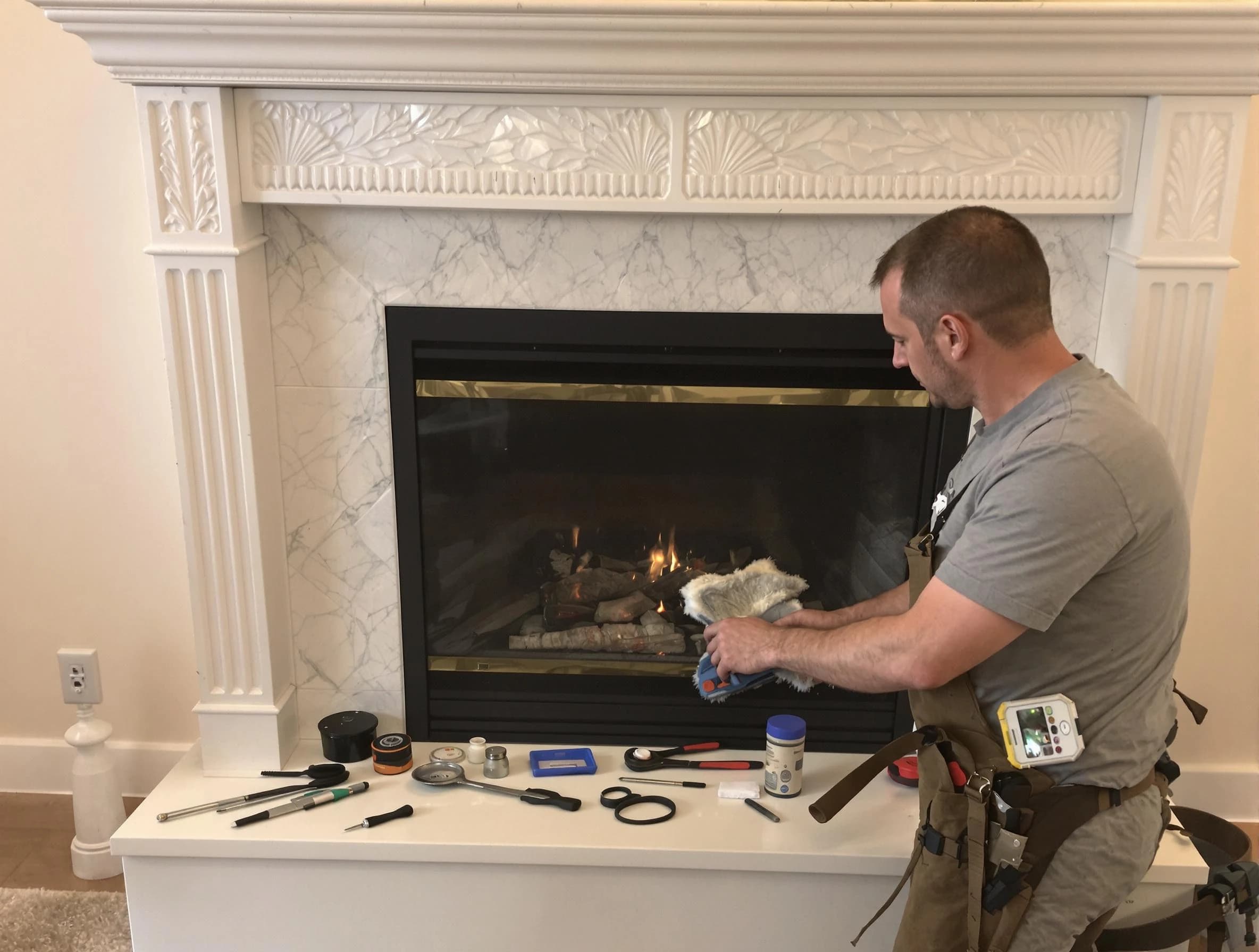 Pelham Chimney Sweep performing fireplace maintenance in Pelham, AL